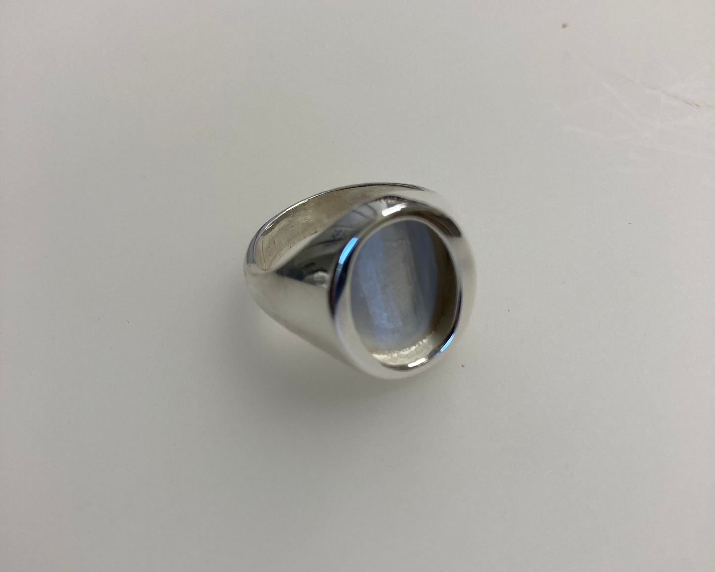 Heavy Stirling silver signet ring with ashes sealed under flat stone