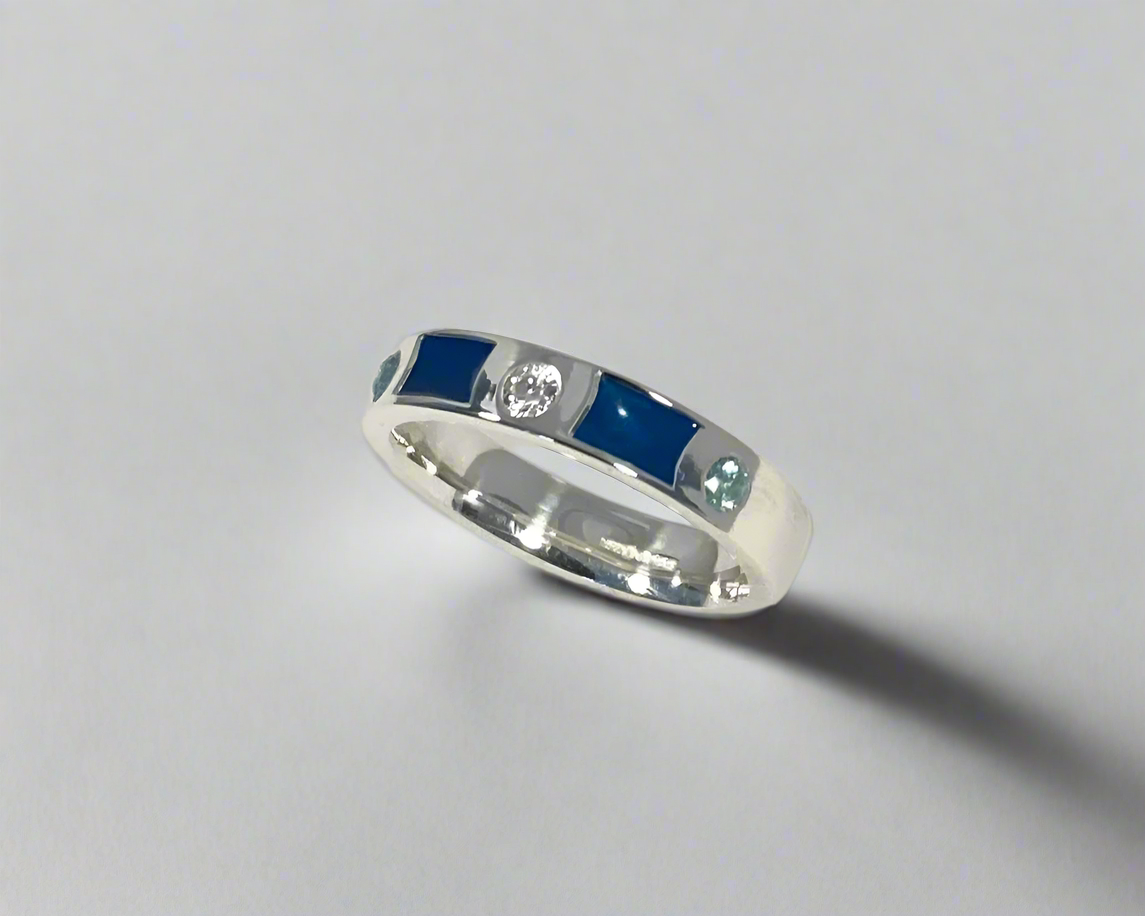 Rub over set 4mm wide Tribute ring with 3 Brilliant cut stones set and Diamond dust in resin