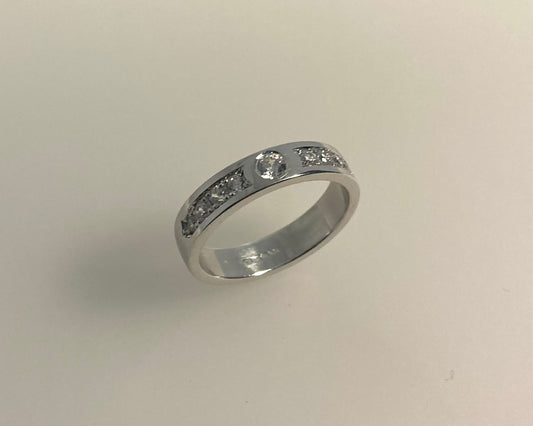 Rub over and pavé set 4mm wide ring with hidden ashes inside shank