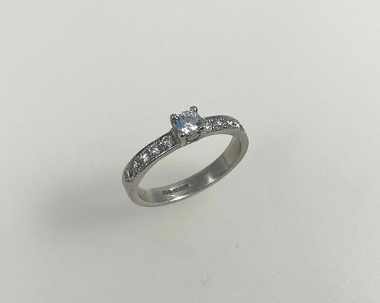 Claw plus pavé set 3mm wide ring with hidden ashes inside shank