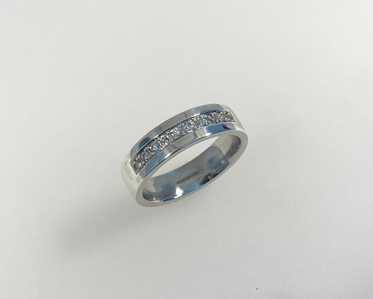 Pavé set 5mm wide flat ring with hidden ashes inside shank
