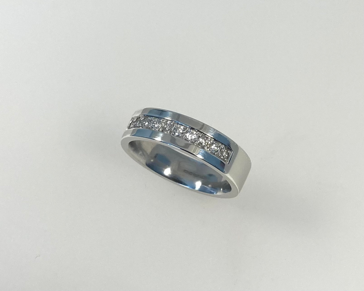 Pavé set 5mm wide flat ring with hidden ashes inside shank