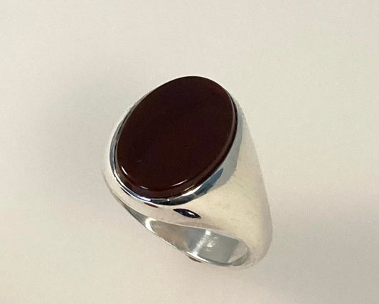 Heavy Stirling silver signet ring with ashes sealed under flat stone