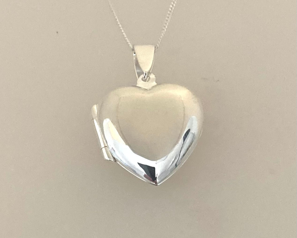 Large Stirling silver heart locket with ashes mixed with resin, plus chain