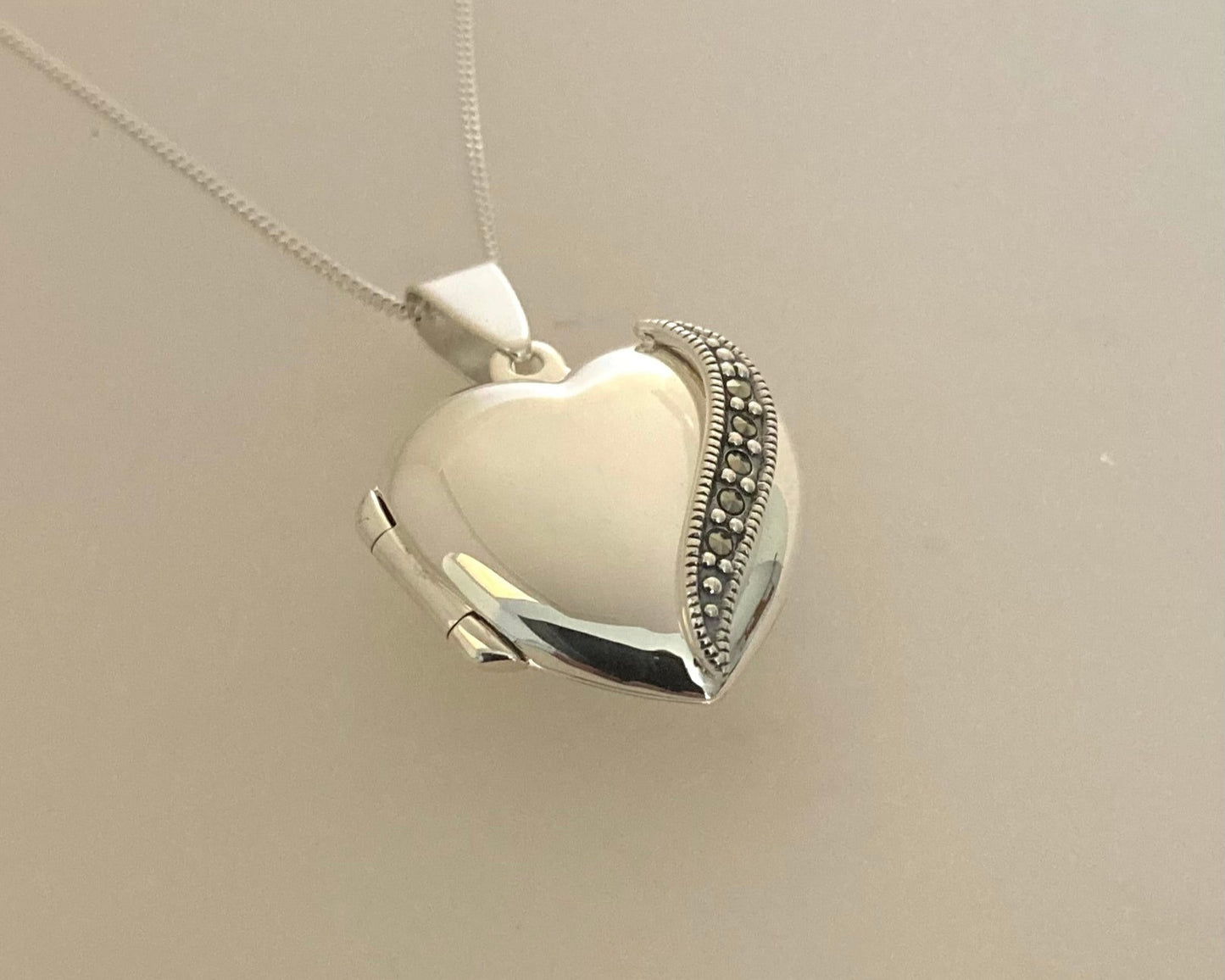 Large marcasite Stirling Silver locket with ashes mixed with resin plus chain
