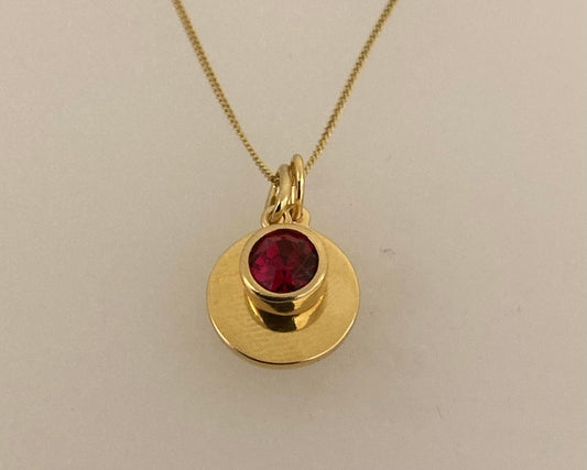 Gold plate over silver Pendant drop and disc with ashes sealed under birthstone plus chain