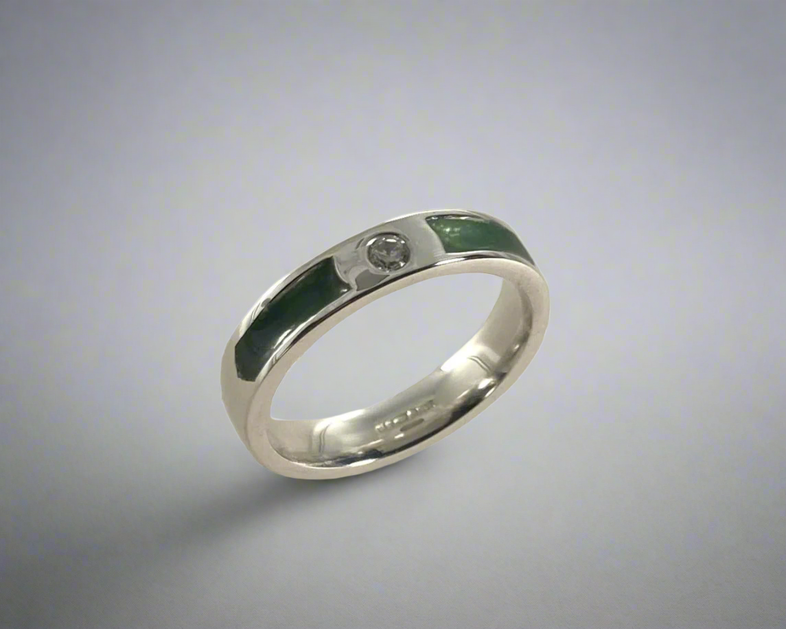 Single Brilliant cut stone set in rub over 4mm wide Flat-shaped Tribute ring with Diamond dust in resin