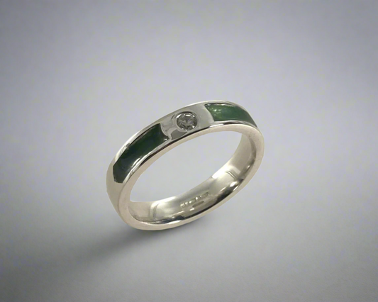 Single Brilliant cut stone set in rub over 4mm wide Flat-shaped Tribute ring with Diamond dust in resin