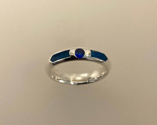 Single Brilliant cut stone set in rub over 4mm wide D-shaped Tribute ring with Diamond dust in resin