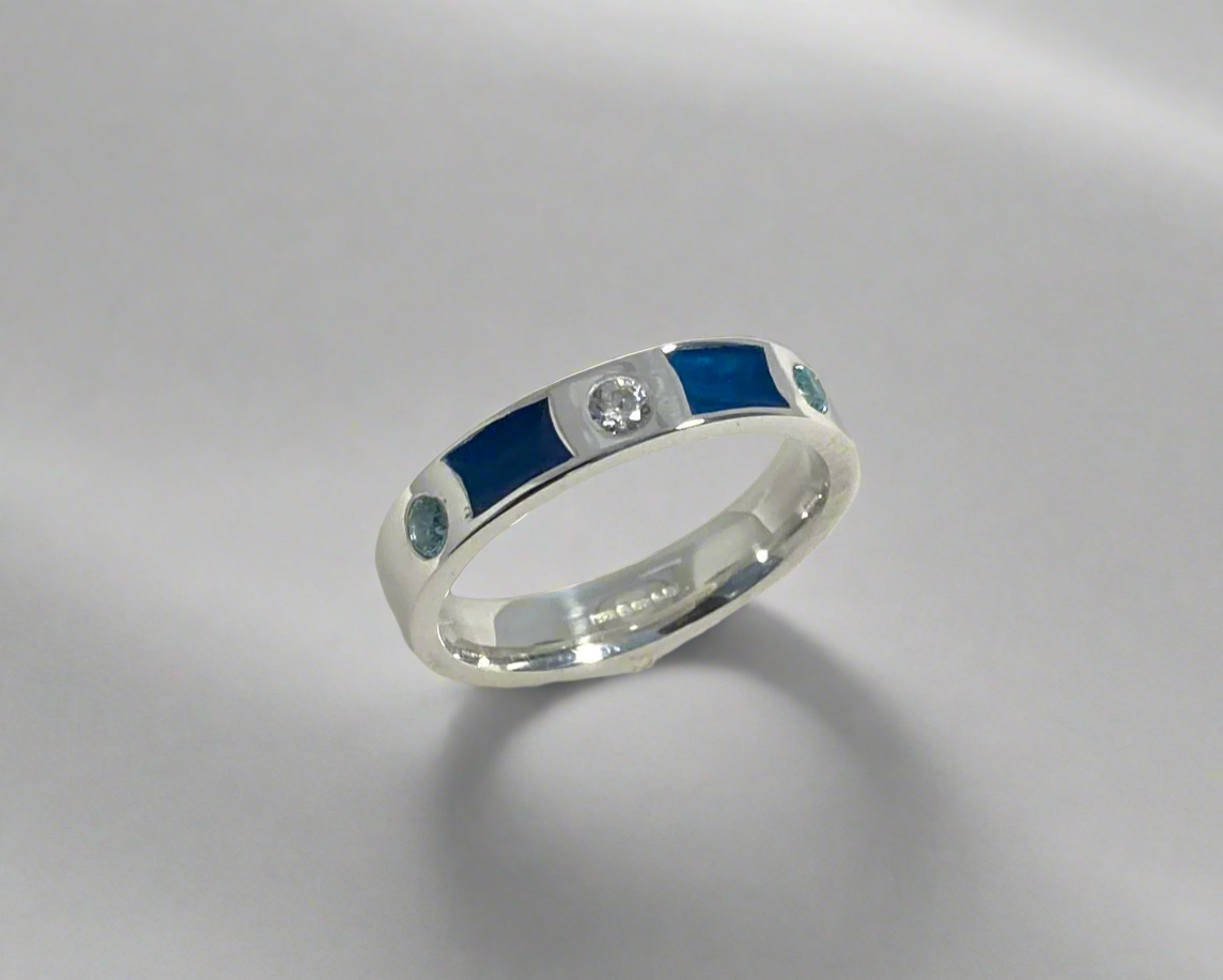 Rub over set 4mm wide Tribute ring with 3 Brilliant cut stones set and Diamond dust in resin