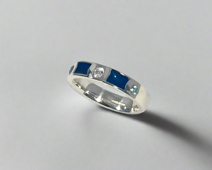 Rub over set 4mm wide Tribute ring with 3 Brilliant cut stones set and Diamond dust in resin