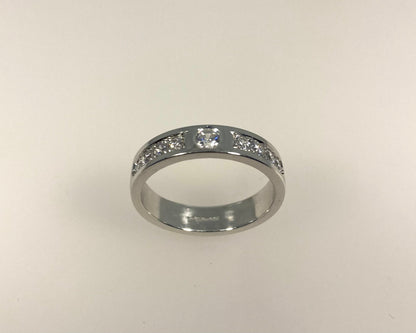 Rub over and pavé set 4mm wide ring with hidden ashes inside shank