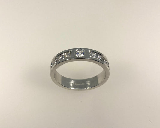 Rub over and pavé set 4mm wide ring with hidden ashes inside shank