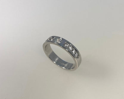 Rub over and pavé set 4mm wide ring with hidden ashes inside shank