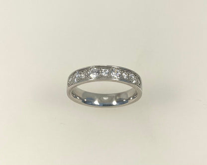 Pavé mill grain set 4mm wide ring with hidden ashes inside shank