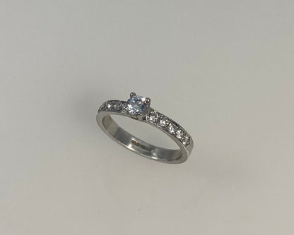 Claw plus pavé set 3mm wide ring with hidden ashes inside shank