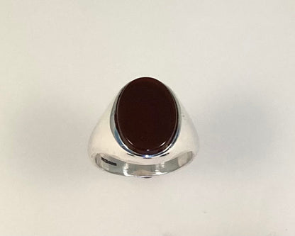 Heavy Stirling silver signet ring with ashes sealed under flat stone
