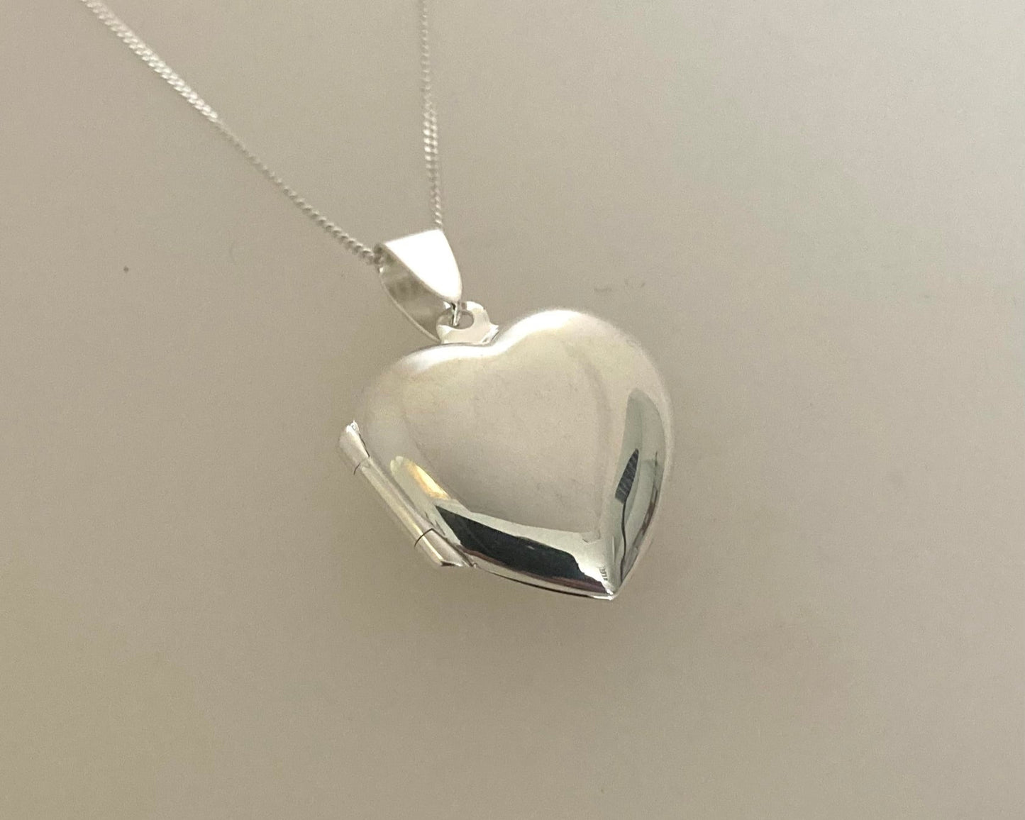 Large Stirling silver heart locket with ashes mixed with resin, plus chain