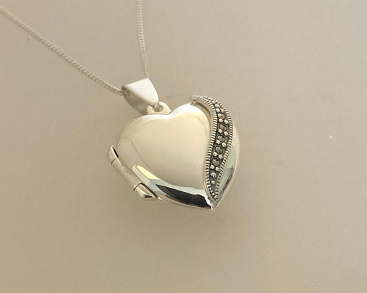 Large marcasite Stirling Silver locket with ashes mixed with resin plus chain