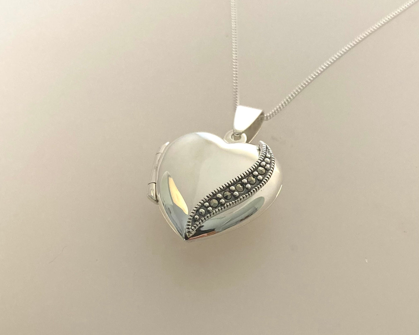 Large marcasite Stirling Silver locket with ashes mixed with resin plus chain