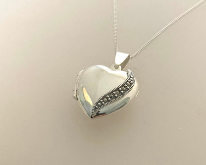 Large marcasite Stirling Silver locket with ashes mixed with resin plus chain