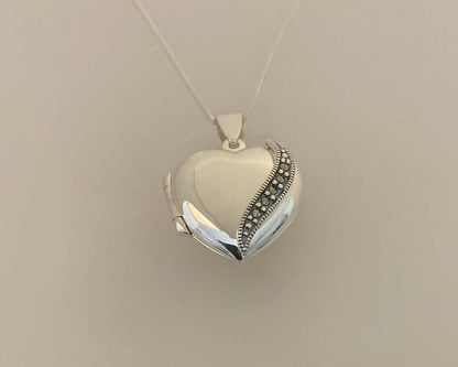 Large marcasite Stirling Silver locket with ashes mixed with resin plus chain