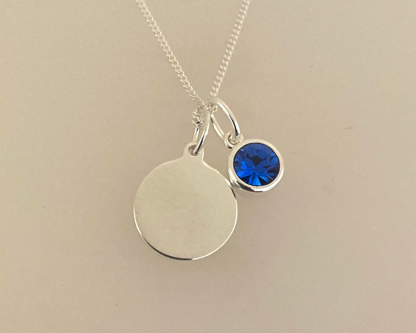 Stirling silver pendant drop and disc with ashes sealed under birthstone