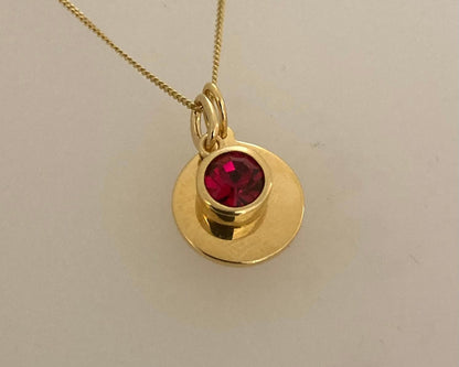 Gold plate over silver Pendant drop and disc with ashes sealed under birthstone plus chain