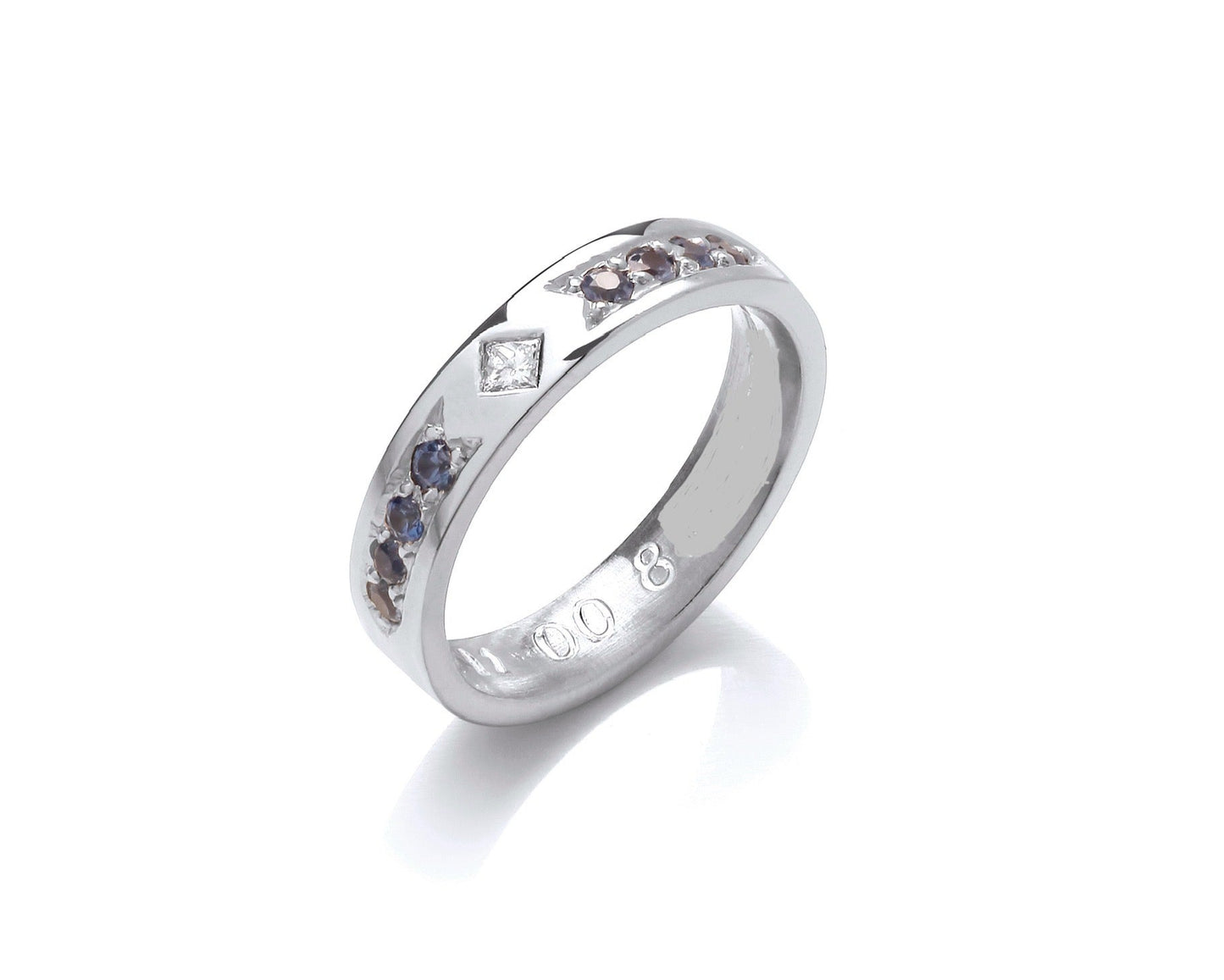 Princess cut diamond set on edge with blue sapphires 4mm wide flat profile ring with hidden ashes inside shank