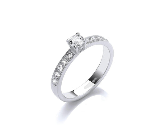 Engagement style with Brilliant cut diamond set in 4 claws plus pavé diamonds set on shoulders 3mm wide ring with hidden ashes inside shank